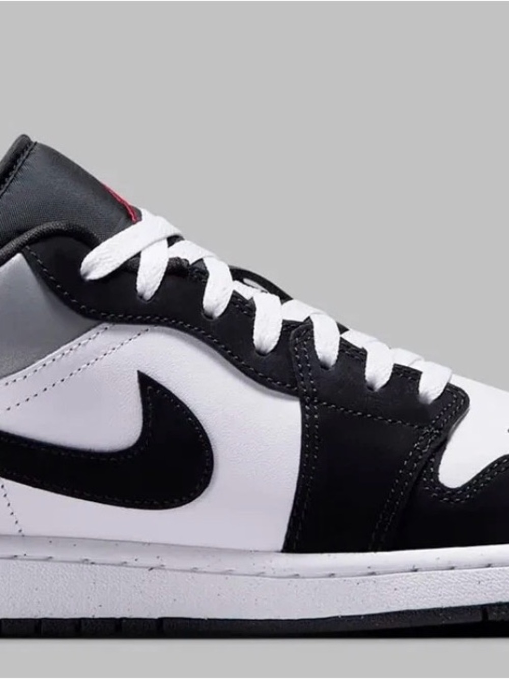 Nike Men’s Black White and Gray Low-Top Swoosh Sneaker